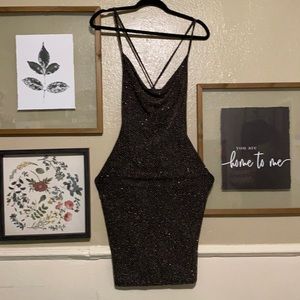 Black Shimmery dress! Loose at the chest area. X straps at the back.